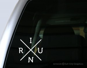 I Run (X) Decal in White shown on truck window