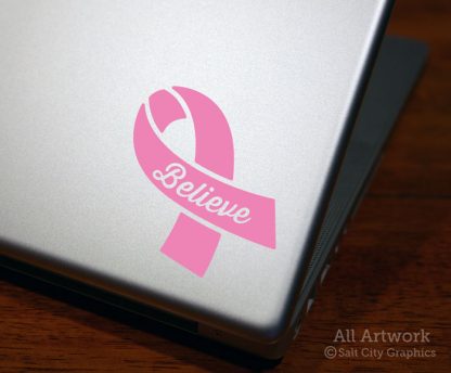 Believe Awareness Ribbon (Breast Cancer) decal in Soft Pink (shown on laptop)