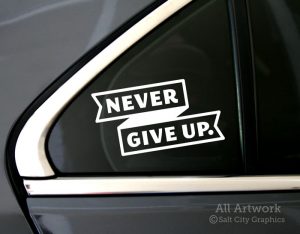 Never Give Up. Decal in White (shown on car window)