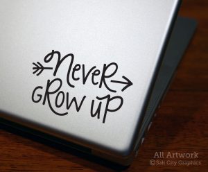 Never Grow Up Decal in Black (shown on laptop)