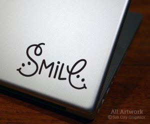 Smile Decal in Black (shown on laptop)