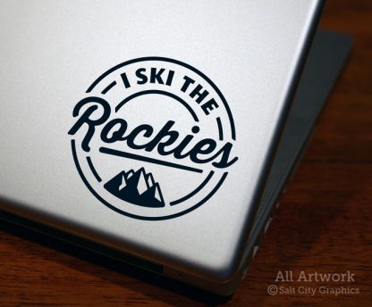 I Ski the Rockies Decal (with Mountains) in Black (shown on laptop)
